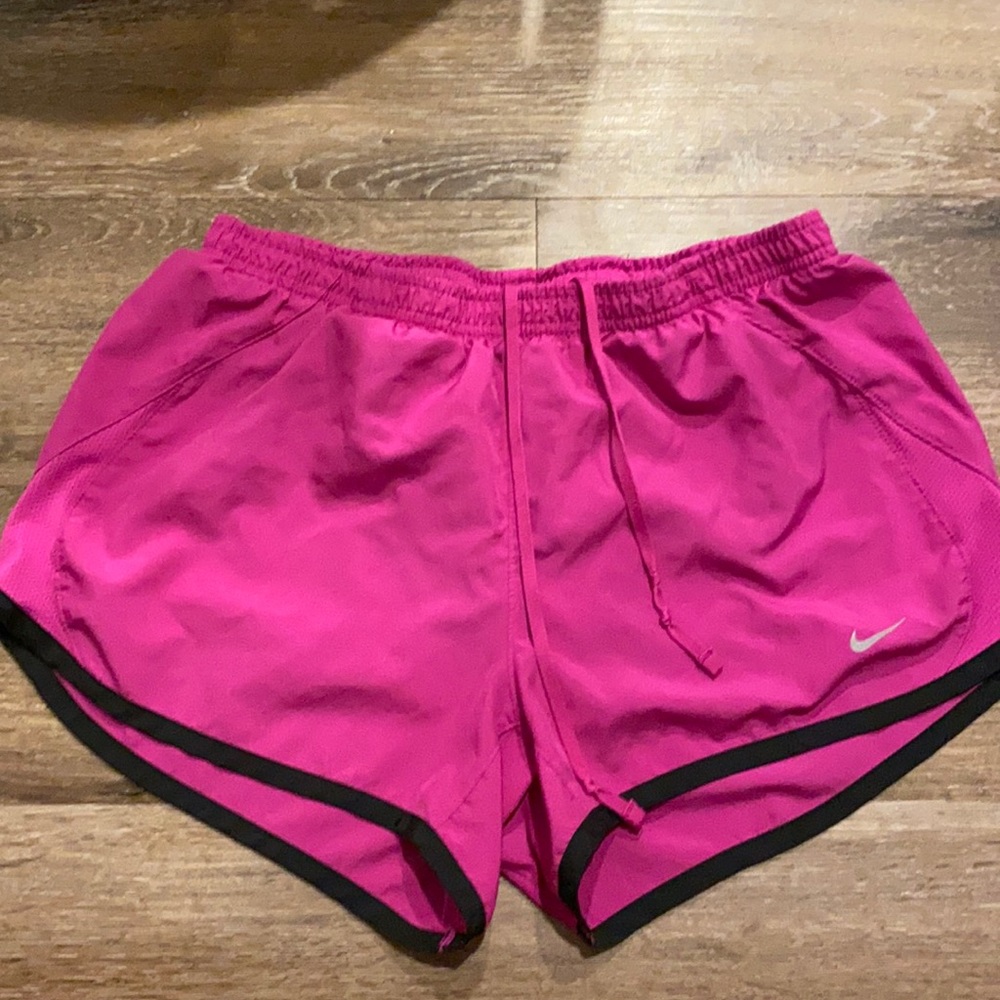 Nike running shorts. Pink with black trim.